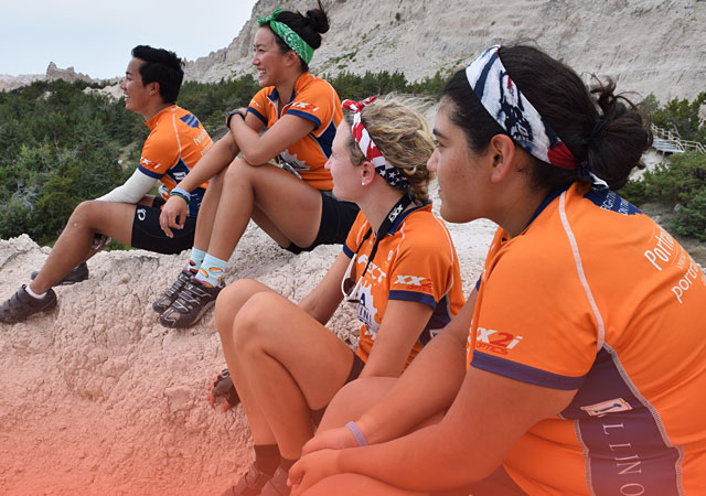 Julissa and her Illini 4000 teammates posing during their cross country trek