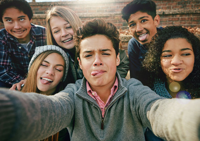 high school students taking a selfie together
