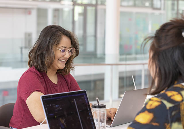 students studying in the newly completed Siebel Center for Design on campus