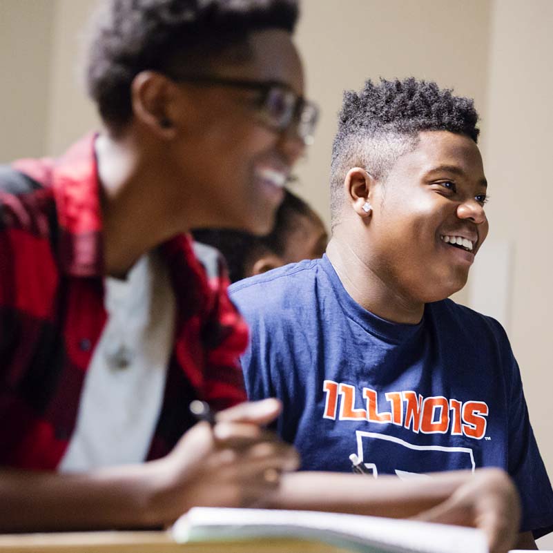 students taking notes in a psychology class in partnership with the Access and Achievement Program (AAP)