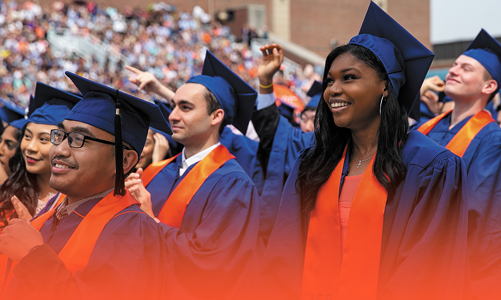 UIUC graduates celebrating at Commencement