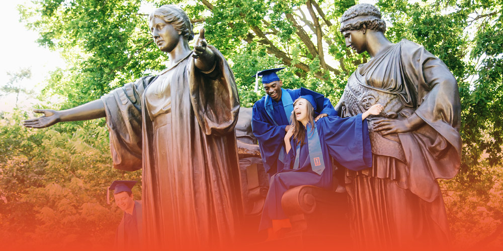 UIUC graduates throwing their caps in the air