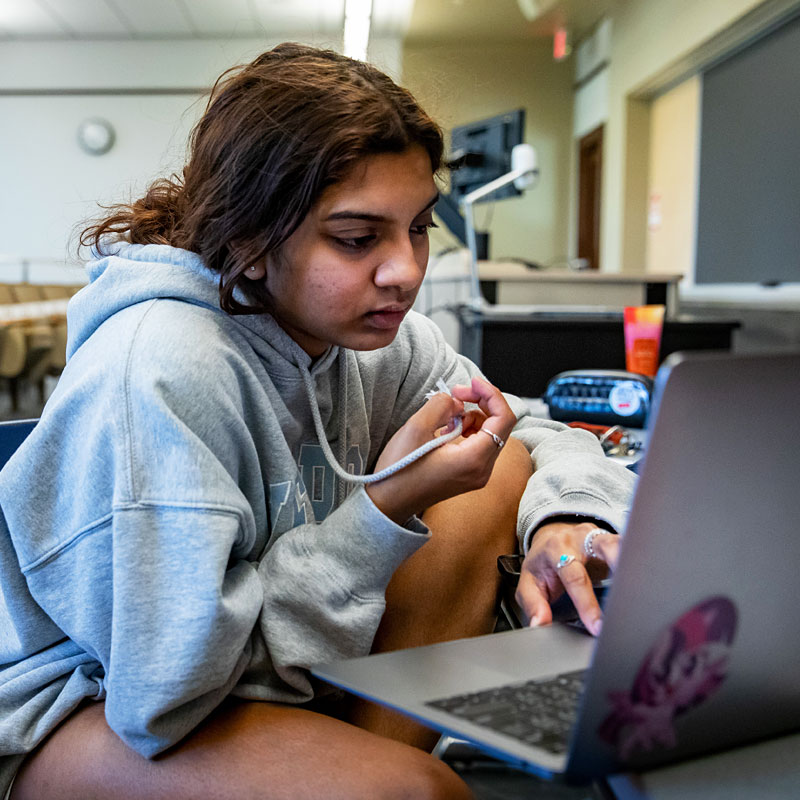 student on their laptop